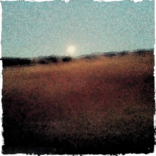 moonrise through a Photoshop filter.